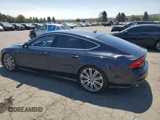 2012 Audi A7 Prestige with VIN WAU3GAFC8CN169767, listed as a Copart auction lot 64520035 with 123,538 mi miles and Salvage title. Bid and sale history available at DreamBid. Image 2.