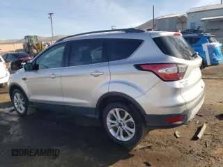 2018 Ford Escape SE with VIN 1FMCU0G96JUC38690, listed as a Copart auction lot 86504514 with 90,811 mi miles and Salvage Title. Bid and sale history available at carsss.com. Image 2.