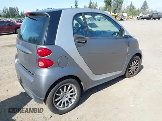 2013 Smart fortwo Pure с VIN WMEEJ3BA5DK622812, выставлен на аукционе IAAI как лот 42356026 с пробегом 64 983 миль миль и . История ставок и продаж доступна на DreamBid. Изображение 4.