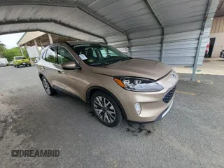 2020 Ford Escape Titanium Hybrid with VIN 1FMCU0DZ5LUB81972, listed as a IAAI auction lot 42679188 with 19,400 mi miles and . Bid and sale history available at DreamBid. Image 12.