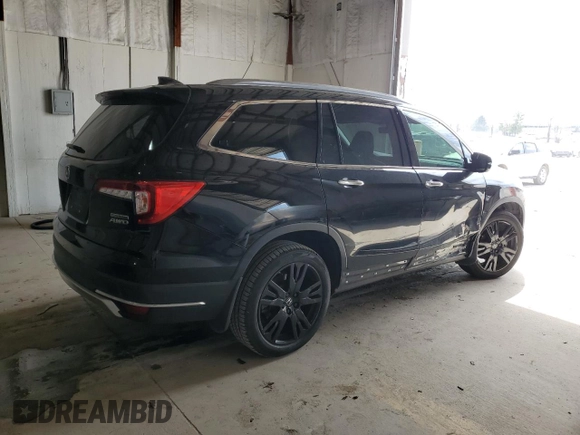 2021 Honda Pilot Touring 8-Passenger with VIN 5FNYF6H97MB062638, listed as a Copart auction lot 50876815 with 49,662 mi miles and Salvage title. Bid and sale history available at DreamBid. Image 3.