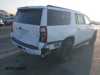 2018 Chevrolet Suburban LS with VIN 1GNSKGKC5JR173889, listed as a IAAI auction lot 42152865 with 73,358 mi miles and . Bid and sale history available at DreamBid. Image 4.