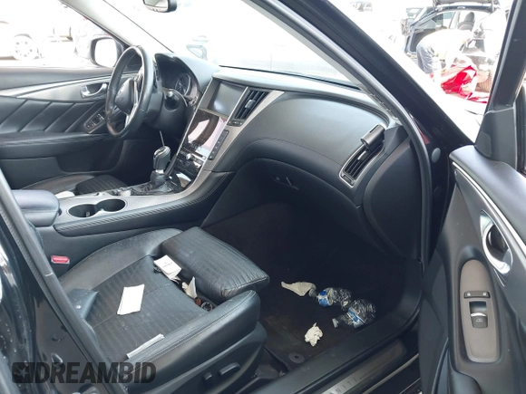 2018 Infiniti Q50 Luxe z VIN JN1EV7AP9JM353684, wystawiony jako IAAI lot #42444432 z przebiegiem 85 036 mil mil oraz . Historia ofert i sprzedaży dostępna na DreamBid. Obrazek 5.