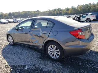2012 Honda Civic EX-L with VIN 19XFB2F94CE048523, listed as a Copart auction lot 77019404 with 210,391 mi miles and Salvage Title. Bid and sale history available at DreamBid. Image 2.