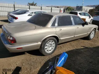 1998 Jaguar XJ with VIN SAJHX1248WC818587, listed as a Copart auction lot 74418114 with 112,395 mi miles and Clean Title. Bid and sale history available at carsss.com. Image 3.