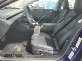 2025 Tesla Model 3 Long Range with VIN 5YJ3E1EA7SF880270, listed as a Copart auction lot 49733925 with 7,542 mi miles and Salvage Title. Bid and sale history available at DreamBid. Image 7.