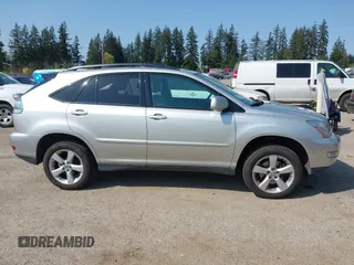 2007 Lexus RX 350 with VIN 2T2HK31U37C028032, listed as a IAAI auction lot 42117631 with 142,430 mi miles. Bid and sale history available at carsss.com. Image 13.