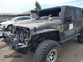 2016 Jeep Wrangler Unlimited Sahara z VIN 1C4HJWEG4GL261147, wystawiony jako IAAI lot #42239252 z przebiegiem 69 604 mil mil oraz . Historia ofert i sprzedaży dostępna na DreamBid. Obrazek 6.
