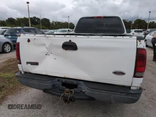 2003 Ford F-150 XL with VIN 1FTRF17W03NA02988, listed as a Copart auction lot 77209084 with Not Provided miles and Salvage Title. Bid and sale history available at DreamBid. Image 6.