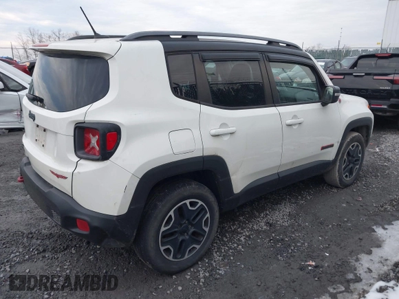 2015 Jeep Renegade Trailhawk with VIN ZACCJBCT5FPB91056, listed as a IAAI auction lot 41609659 with 145,109 mi miles and . Bid and sale history available at DreamBid. Image 4.