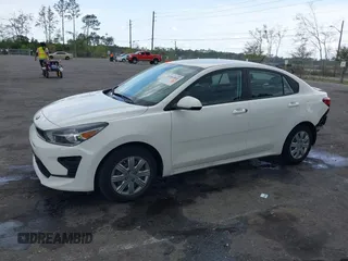 2021 Kia Rio LX with VIN 3KPA24AD0ME395186, listed as a IAAI auction lot 41865802 with 52,351 mi miles and . Bid and sale history available at DreamBid. Image 14.