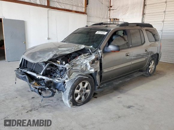 2004 GMC Envoy SLT with VIN 1GKET16S146222288, listed as a Copart auction lot 49316405 with 210,424 mi miles and Salvage Title. Bid and sale history available at DreamBid. Image 1.