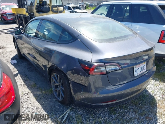 2022 Tesla Model 3 with VIN 5YJ3E1EA0NF344782, listed as a IAAI auction lot 41803469 with 16,973 mi miles and . Bid and sale history available at DreamBid. Image 3.
