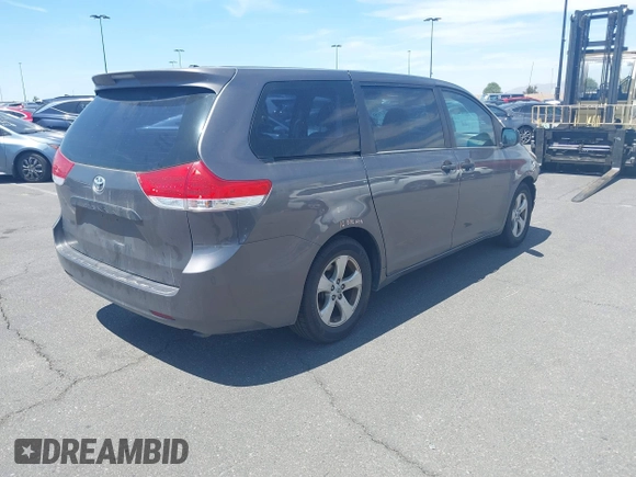 2012 Toyota Sienna with VIN 5TDZK3DC9CS261944, listed as a IAAI auction lot 41885359 with 184,918 mi miles. Bid and sale history available at carsss.com. Image 4.