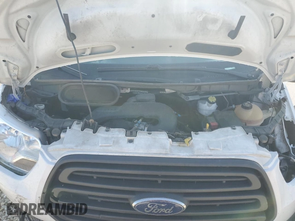 2018 Ford Transit with VIN 1FTYR1YM7JKB32779, listed as a Copart auction lot 55868195 with 112,354 mi miles and Salvage title. Bid and sale history available at DreamBid. Image 12.