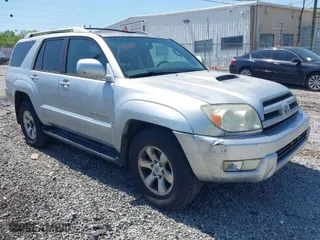 2004 Toyota 4Runner SR5 with VIN JTEBU14R448015129, listed as a IAAI auction lot 42040611 with 243,818 mi miles. Bid and sale history available at carsss.com. Image 1.