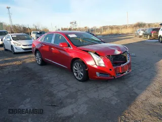 2014 Cadillac XTS Luxury with VIN 2G61M5S32E9149233, listed as a IAAI auction lot 41300177 with 60,888 mi miles. Bid and sale history available at carsss.com. Image 1.