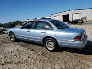 1997 Ford Crown Victoria LX z VIN 2FALP74W1VX218463, wystawiony jako Copart lot #52851045 z przebiegiem 236 098 mil mil oraz Szkoda całkowita • Salvage title. Historia ofert i sprzedaży dostępna na DreamBid. Obrazek 2.