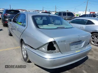 2002 Mercedes-Benz S-Class 5.0L with VIN WDBNG75J52A312063, listed as a IAAI auction lot 41818901 with 191,729 mi miles. Bid and sale history available at carsss.com. Image 6.