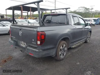 2017 Honda Ridgeline RTL-E with VIN 5FPYK3F76HB034774, listed as a IAAI auction lot 41754824 with 67,451 mi miles. Bid and sale history available at carsss.com. Image 4.