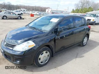 2012 Nissan Versa S with VIN 3N1BC1CP9CK290446, listed as a IAAI auction lot 41861756 with 124,883 mi miles. Bid and sale history available at carsss.com. Image 6.