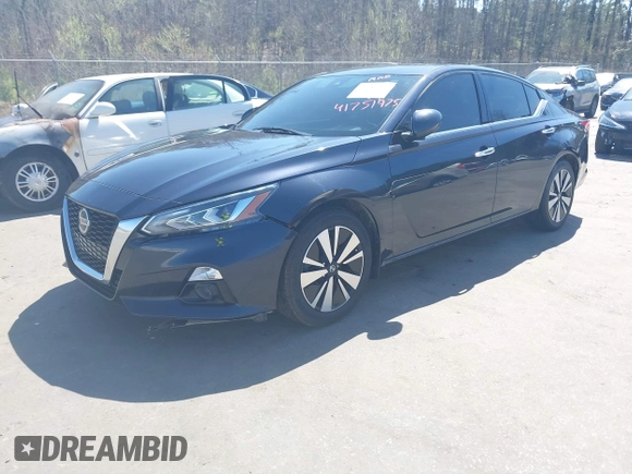 2019 Nissan Altima 2.5 Platinum with VIN 1N4BL4FV2KC113644, listed as a IAAI auction lot 41751975 with 125,617 mi miles. Bid and sale history available at carsss.com. Image 2.