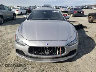 2014 Maserati Ghibli z VIN ZAM57XSA3E1105712, wystawiony jako Copart lot #47751435 z przebiegiem 88 432 mil mil oraz Szkoda całkowita • Salvage title. Historia ofert i sprzedaży dostępna na DreamBid. Obrazek 5.