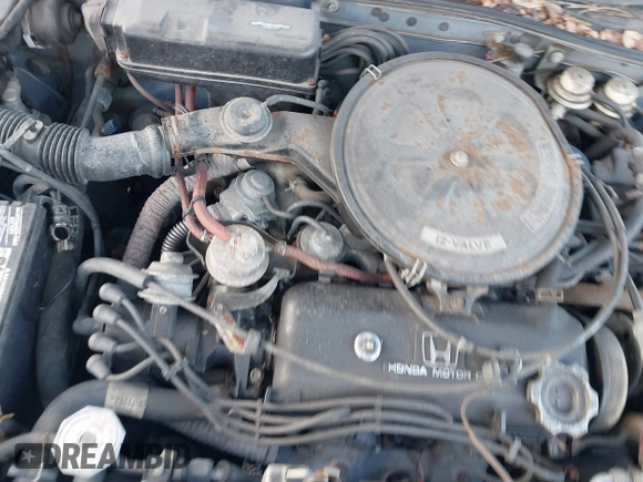1986 Honda Civic z VIN JHMAK7439GS063929, wystawiony jako IAAI lot #41594413 z przebiegiem Nie podano mil oraz . Historia ofert i sprzedaży dostępna na DreamBid. Obrazek 10.