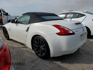 2014 Nissan 370Z Touring with VIN JN1AZ4FH8EM621259, listed as a Copart auction lot 77571454 with Not Provided miles and Salvage Title. Bid and sale history available at DreamBid. Image 2.