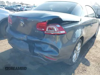 2015 Volkswagen Eos Komfort with VIN WVWBW8AH7FV004228, listed as a IAAI auction lot 41659825 with 71,468 mi miles and . Bid and sale history available at DreamBid. Image 6.