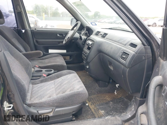 1999 Honda CR-V EX z VIN JHLRD1868XC046181, wystawiony jako IAAI lot #42405041 z przebiegiem 156 239 mil mil oraz . Historia ofert i sprzedaży dostępna na DreamBid. Obrazek 5.