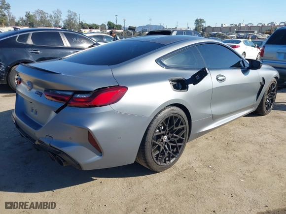 2023 BMW M8 Competition with VIN WBSAE0C0XPCM48877, listed as a IAAI auction lot 41676318 with 18,572 mi miles. Bid and sale history available at carsss.com. Image 4.