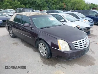 2008 Cadillac DTS 1SC z VIN 1G6KD57Y28U146476, wystawiony jako IAAI lot #42479598 z przebiegiem 248 525 mil mil oraz . Historia ofert i sprzedaży dostępna na DreamBid. Obrazek 1.