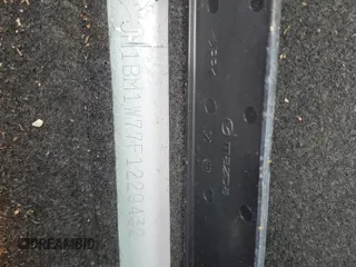 2015 Mazda 3 i Grand Touring z VIN JM1BM1W77F1229432, wystawiony jako Copart lot #49302495 z przebiegiem 87 028 mil mil oraz Szkoda całkowita • Salvage title. Historia ofert i sprzedaży dostępna na DreamBid. Obrazek 12.