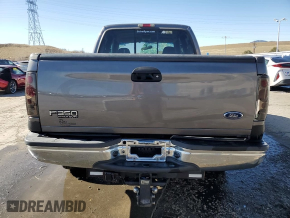 2002 Ford F-350 XL с VIN 1FTSW31F62ED36138, выставлен на аукционе Copart как лот 48914445 с пробегом 168 537 миль миль и Списание • Salvage title. История ставок и продаж доступна на DreamBid. Изображение 6.