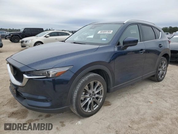 2021 Mazda CX-5 Signature with VIN JM3KFBEY9M0343758, listed as a Copart auction lot 46469785 with 41,757 mi miles and Salvage Title. Bid and sale history available at carsss.com. Image 1.