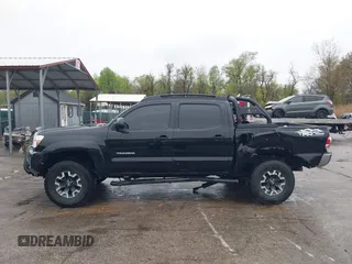 2015 Toyota Tacoma with VIN 3TMLU4ENXFM185371, listed as a IAAI auction lot 41952513 with 87,128 mi miles and . Bid and sale history available at DreamBid. Image 14.