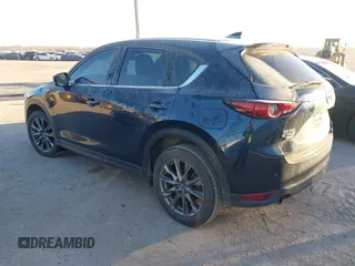 2019 Mazda CX-5 Signature with VIN JM3KFBEY5K0656965, listed as a IAAI auction lot 41421453 with 99,073 mi miles. Bid and sale history available at carsss.com. Image 3.