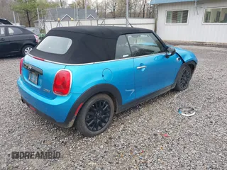 2016 MINI Convertible with VIN WMWWG5C52G3A81084, listed as a IAAI auction lot 41954333 with 78,558 mi miles and . Bid and sale history available at DreamBid. Image 4.