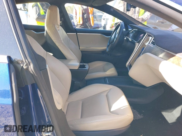 2016 Tesla Model S 90D with VIN 5YJSA1E25GF144614, listed as a IAAI auction lot 40941311 with 83,587 mi miles and . Bid and sale history available at DreamBid. Image 5.