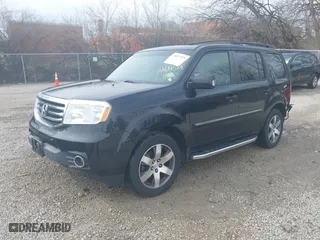 2012 Honda Pilot Touring with VIN 5FNYF4H98CB034737, listed as a IAAI auction lot 41877379 with 182,301 mi miles. Bid and sale history available at carsss.com. Image 20.