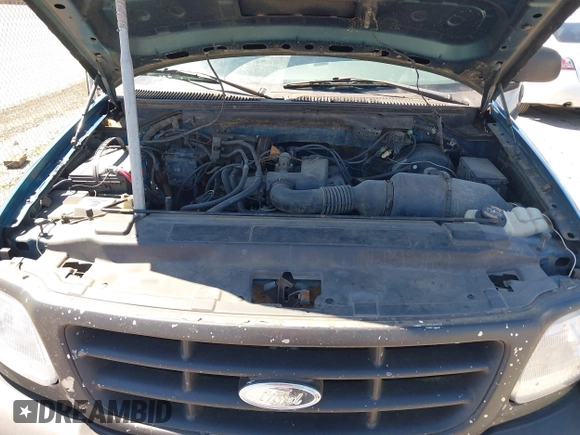 2000 Ford F-150 XL with VIN 3FTZF1722YMA80722, listed as a IAAI auction lot 40449042 with 205,576 mi miles and . Bid and sale history available at DreamBid. Image 10.