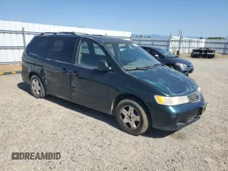 2000 Honda Odyssey EX z VIN 2HKRL1867YH587616, wystawiony jako Copart lot #57258795 z przebiegiem 219 999 mil mil oraz Szkoda całkowita • Salvage title. Historia ofert i sprzedaży dostępna na DreamBid. Obrazek 4.