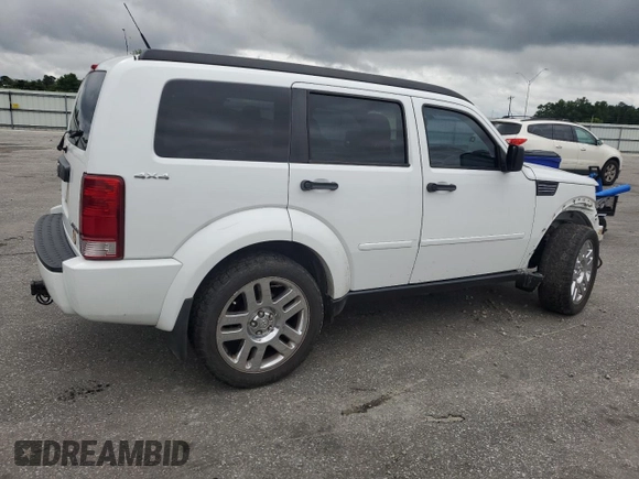2011 Dodge Nitro Heat z VIN 1D4PU4GK9BW529192, wystawiony jako Copart lot #58587275 z przebiegiem 101 538 mil mil oraz Szkoda całkowita • Salvage title. Historia ofert i sprzedaży dostępna na DreamBid. Obrazek 3.