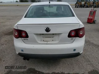 2009 Volkswagen Jetta S with VIN 3VWJM71K69M035974, listed as a Copart auction lot 56979765 with Not provided miles and Salvage title. Bid and sale history available at DreamBid. Image 6.