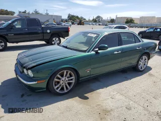 2004 Jaguar XJ R with VIN SAJWA73B64TG15853, listed as a Copart auction lot 56892795 with 118,966 mi miles and Clean title. Bid and sale history available at DreamBid. Image 1.