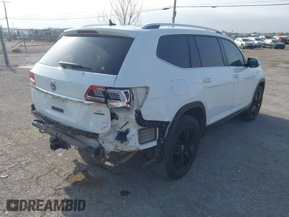 2019 Volkswagen Atlas SEL z VIN 1V2MR2CA8KC569640, wystawiony jako IAAI lot #42083995 z przebiegiem 127 104 mil mil oraz . Historia ofert i sprzedaży dostępna na DreamBid. Obrazek 4.