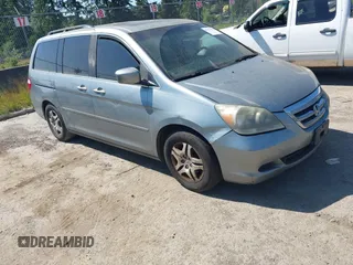 2007 Honda Odyssey EX-L z VIN 5FNRL38737B005111, wystawiony jako IAAI lot #42357279 z przebiegiem 161 420 mil mil oraz . Historia ofert i sprzedaży dostępna na DreamBid. Obrazek 1.
