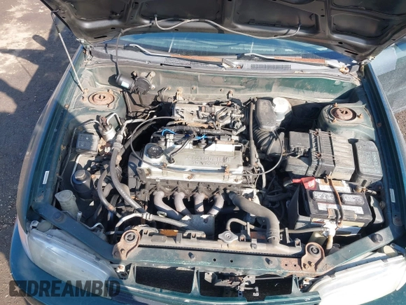 2001 Mitsubishi Mirage ES z VIN JA3AY26C91U041410, wystawiony jako IAAI lot #41360183 z przebiegiem 322 178 mil mil oraz . Historia ofert i sprzedaży dostępna na DreamBid. Obrazek 10.