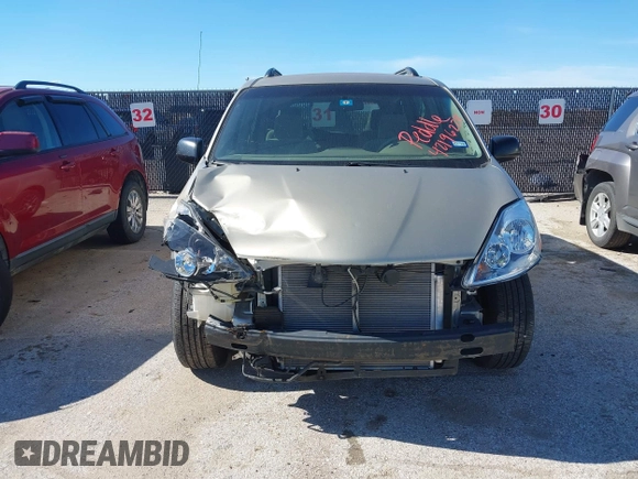 2006 Toyota Sienna CE with VIN 5TDZA23C16S457699, listed as a IAAI auction lot 42196228 with 220,910 mi miles and . Bid and sale history available at carsss.com. Image 6.